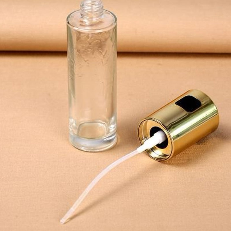 Separated lid and base oil spray bottle