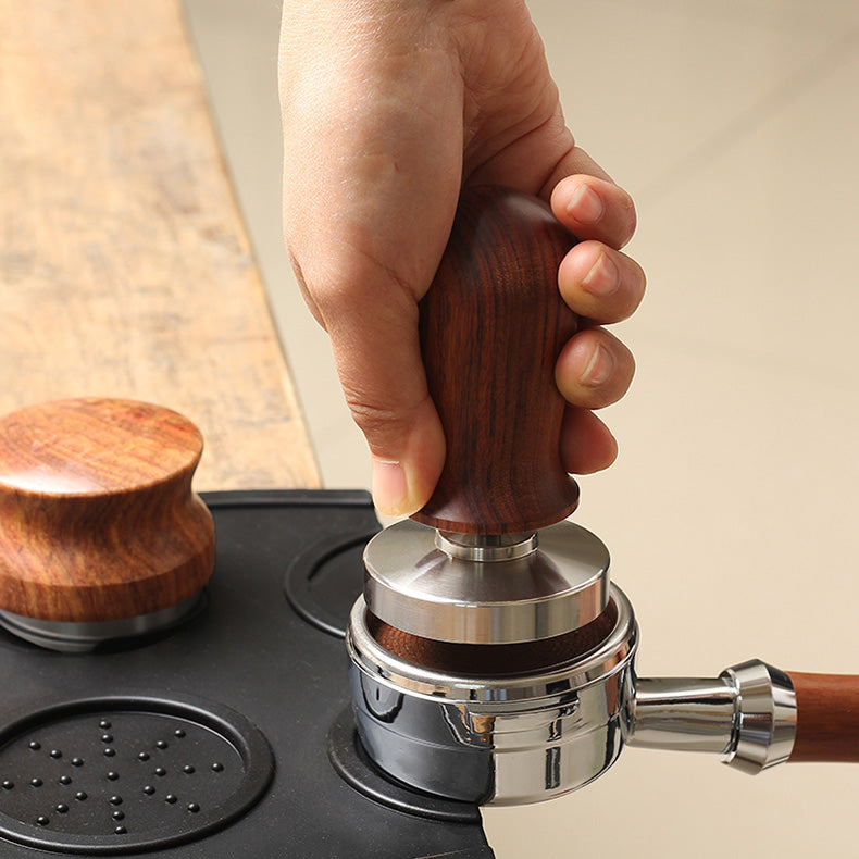 black coffee tamper mat in use