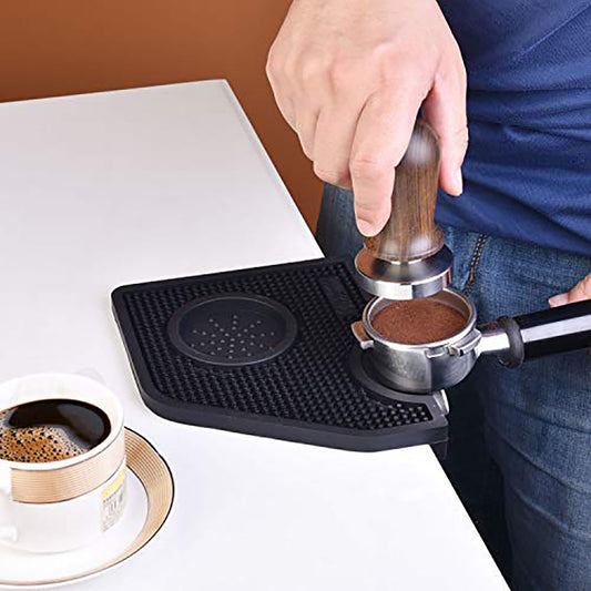 black coffee tamper mat in use