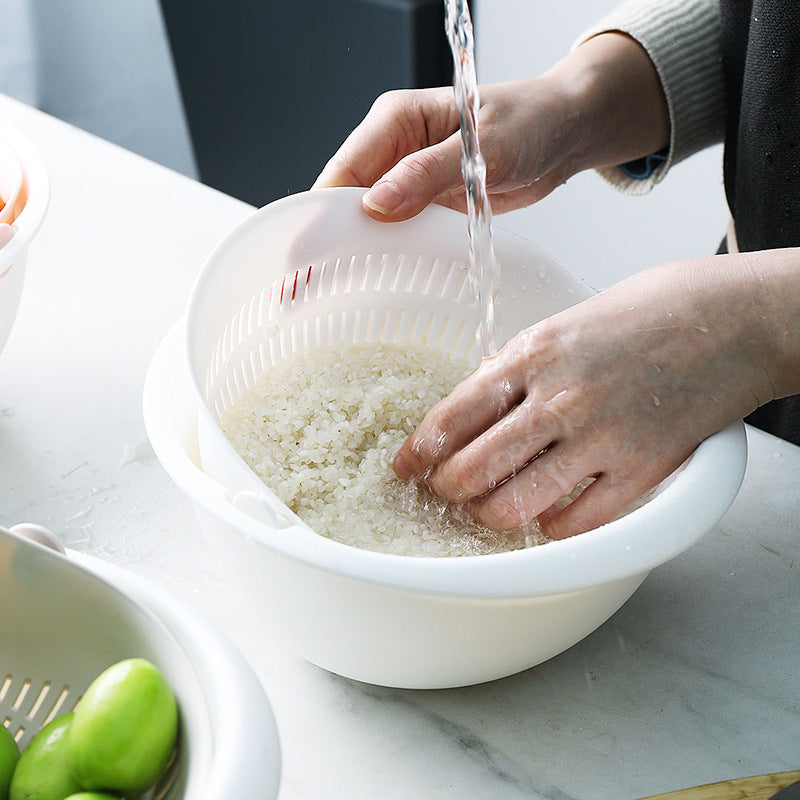 White Double-Layered Colander in use