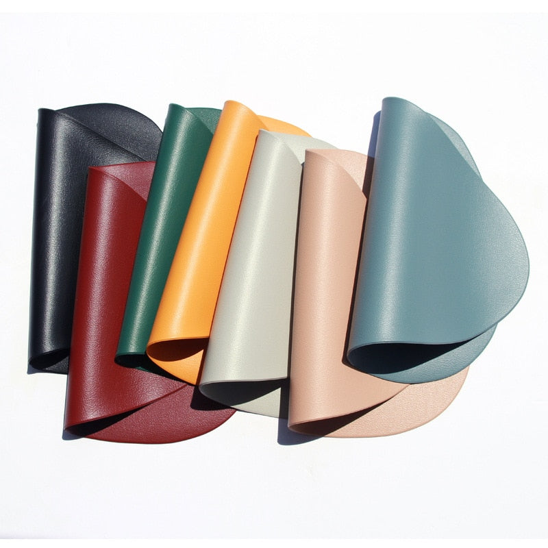 Folded leather look colourful oval placemats