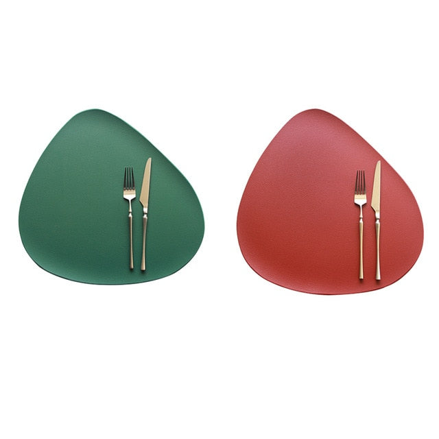 Green and red leather look placemat with knife and fork