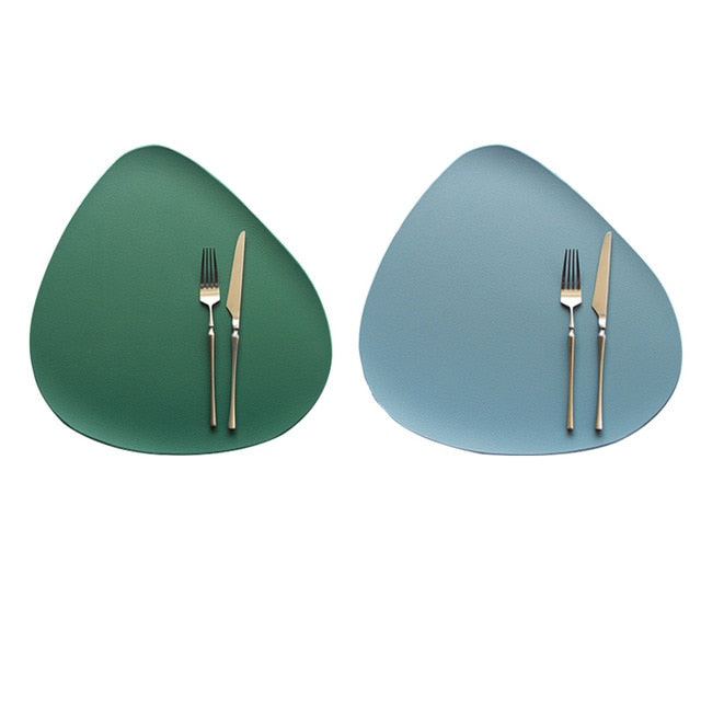 Blue and green leather look placemat with knife and fork