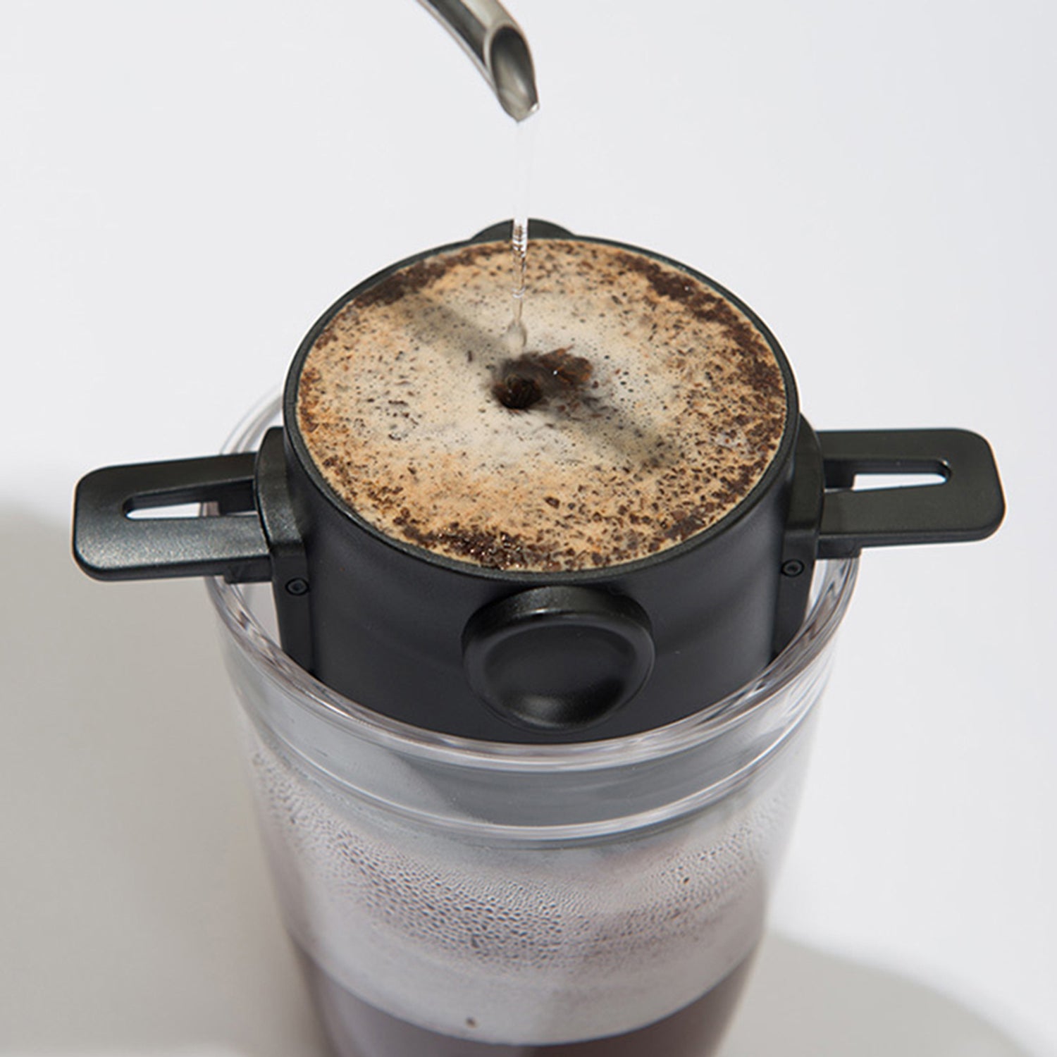 black paperless coffee filter being used