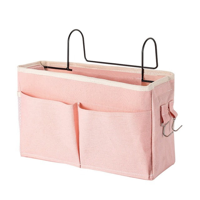 Pink canvas bedside hanging storage bag